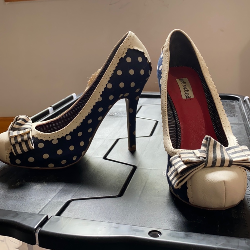Not rated navy blue polka dot heel with white trim
